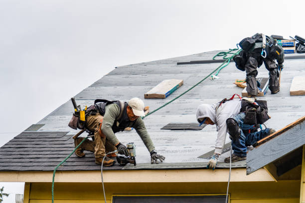 Professional Gutter Installation technician working in Charlotte, IA